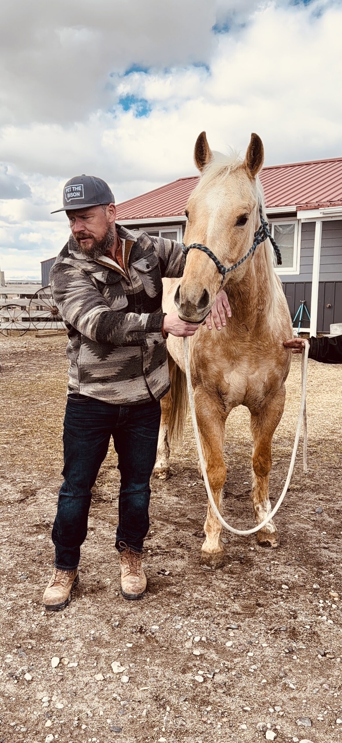 Dr. Josh Prange providing animal chiropractic care outside the clinic