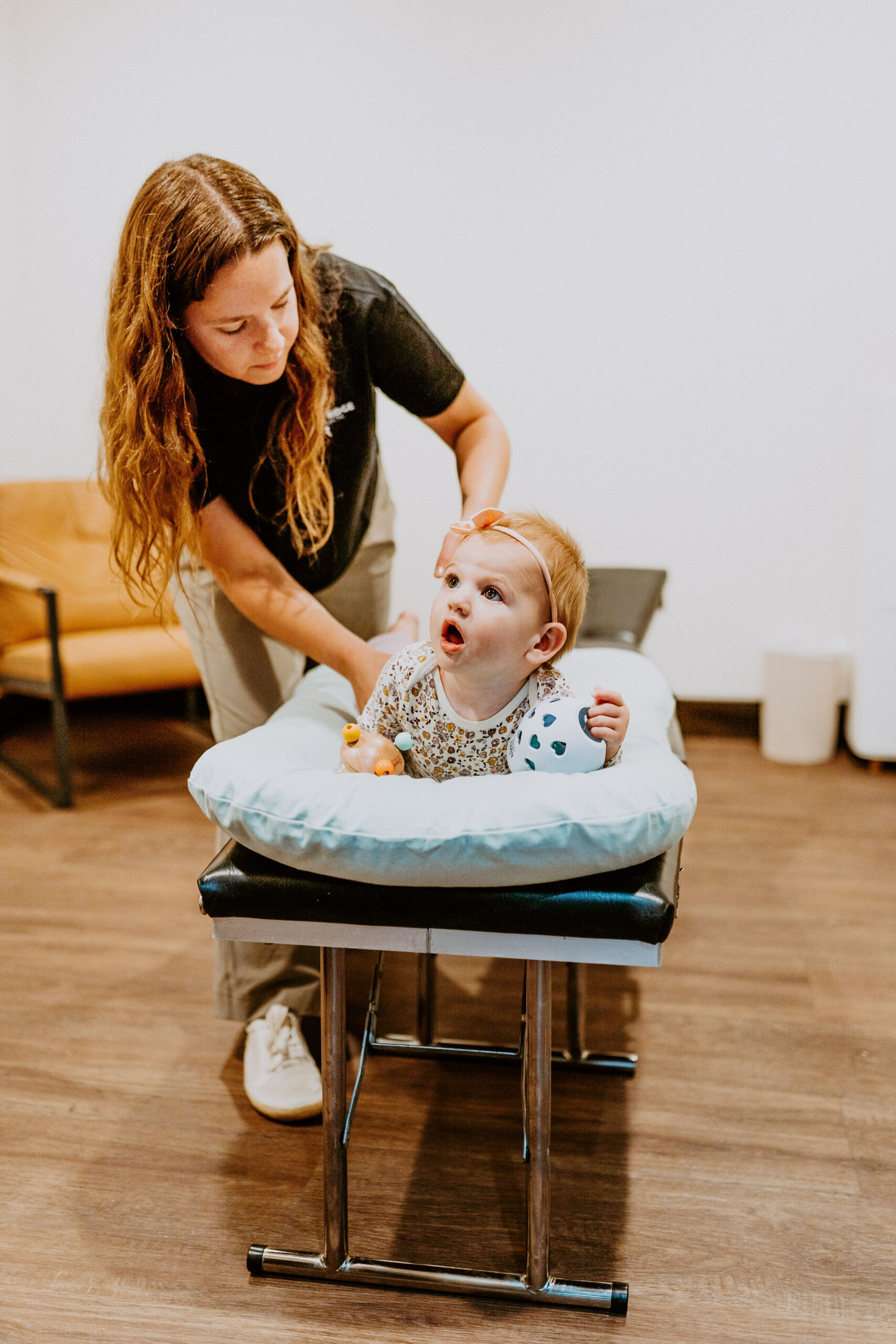 Gentle hands-on pediatric chiropractic care with Dr. Claire Schauf