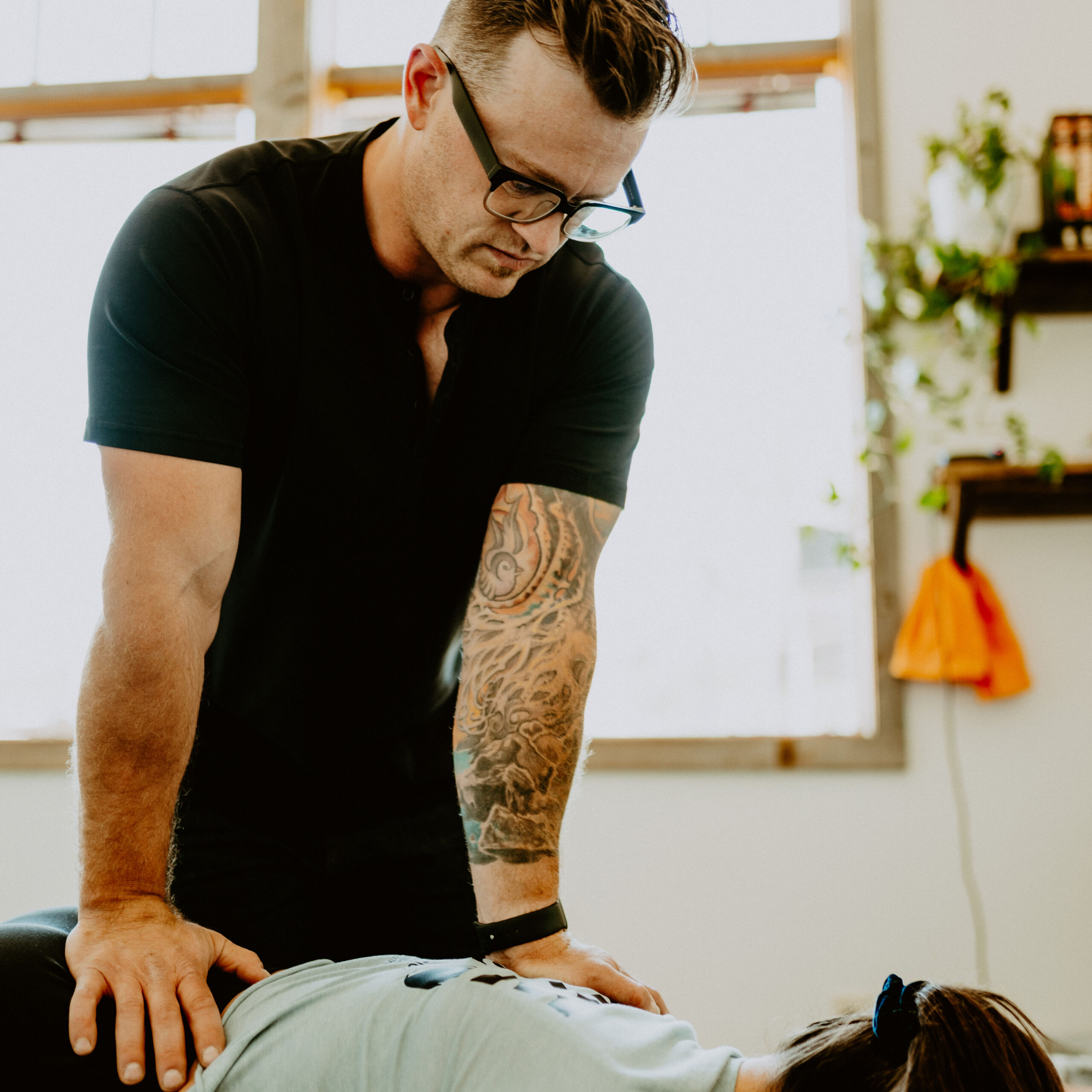 Dr. David Dalgardno providing chiropractic care at Windy Ridge Chiropractic