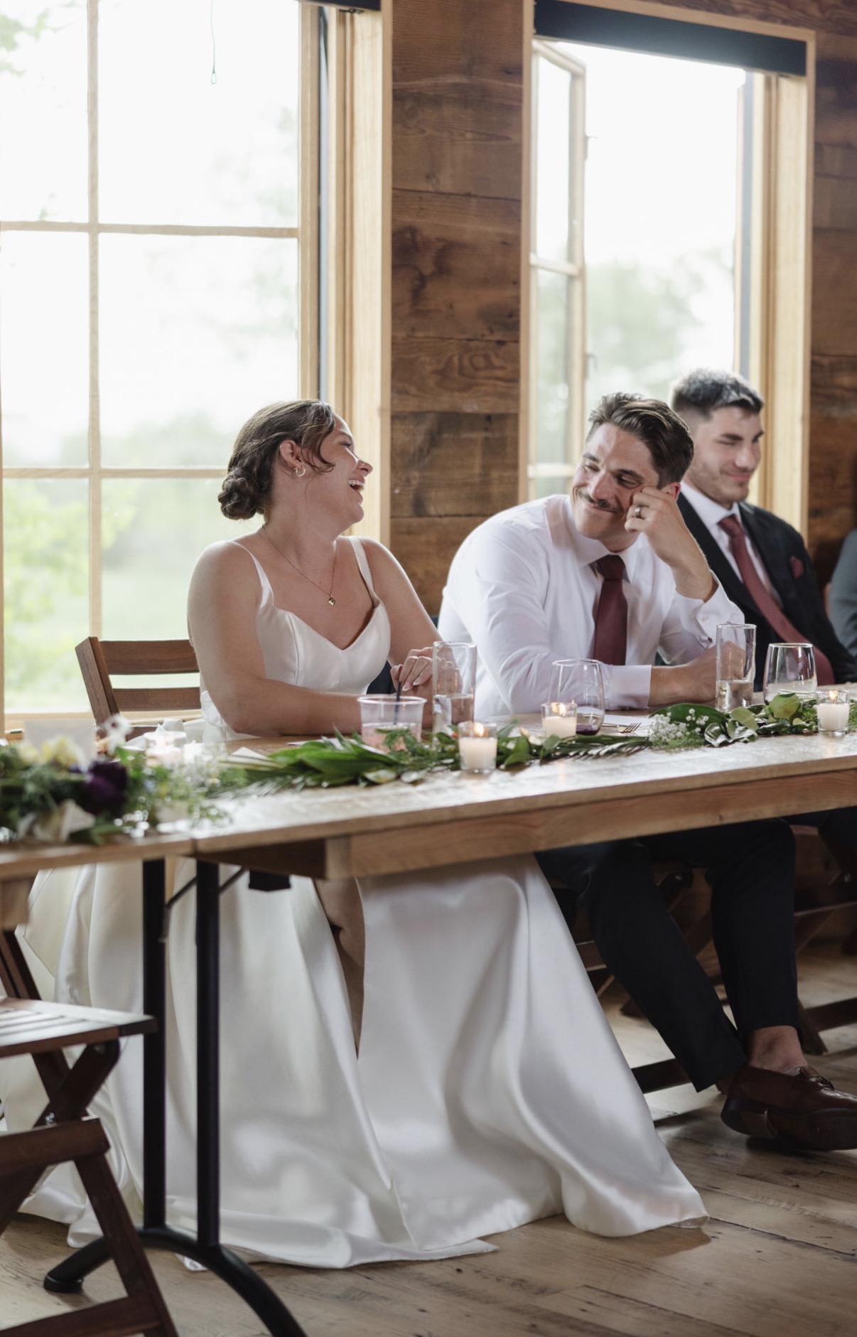 Dr. Kyle DeLamielleure sharing a moment with his wife at their Montana wedding