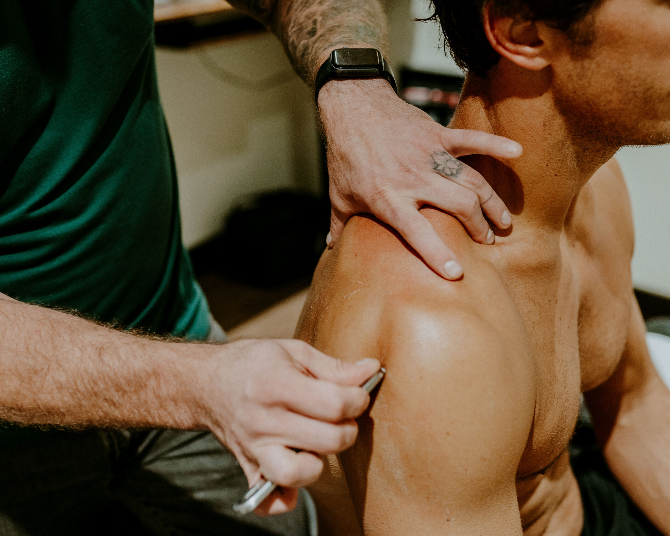 IASTM applied to a patient’s shoulder at Windy Ridge Chiropractic