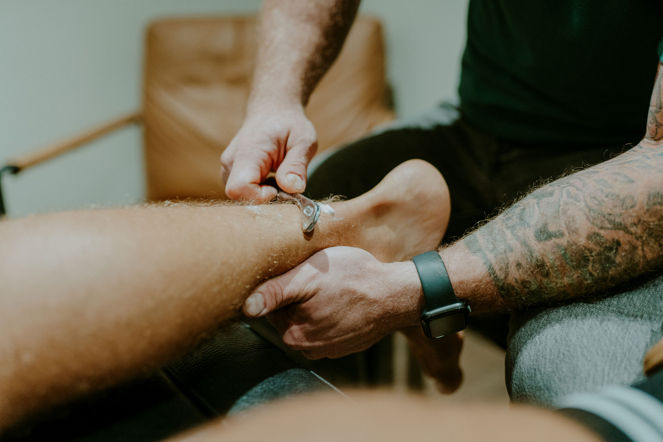 IASTM applied to a patient’s calf at Windy Ridge Chiropractic